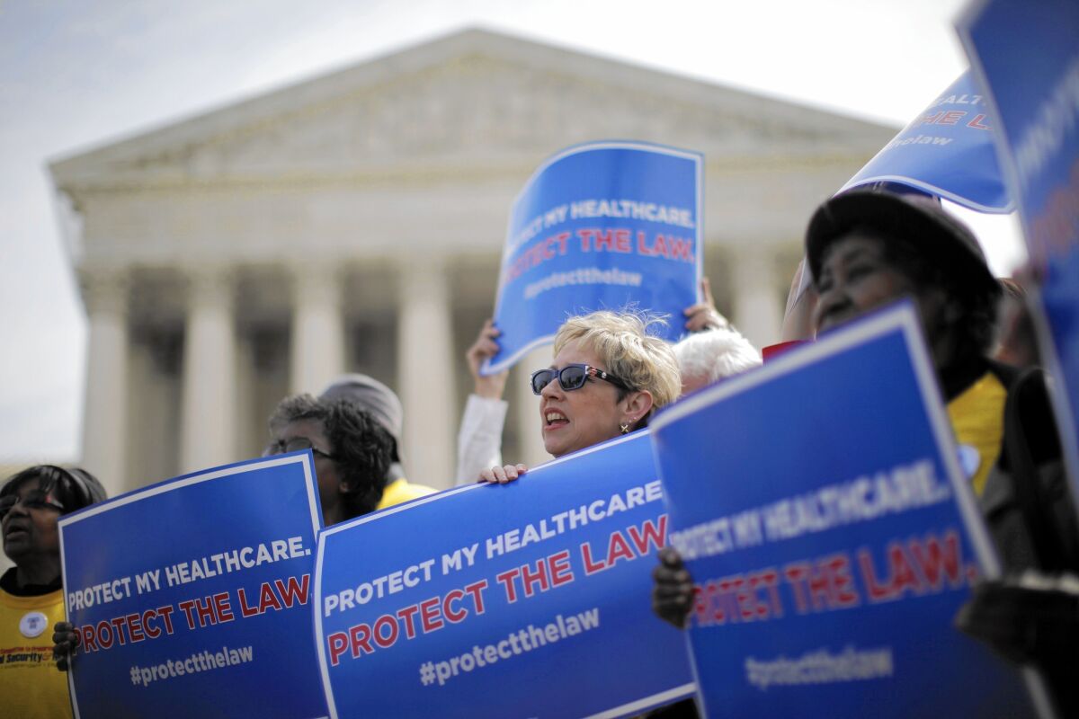 Supporters of the Affordable Care Act rally in 2012 as the Supreme Court considered a challenge to the law.