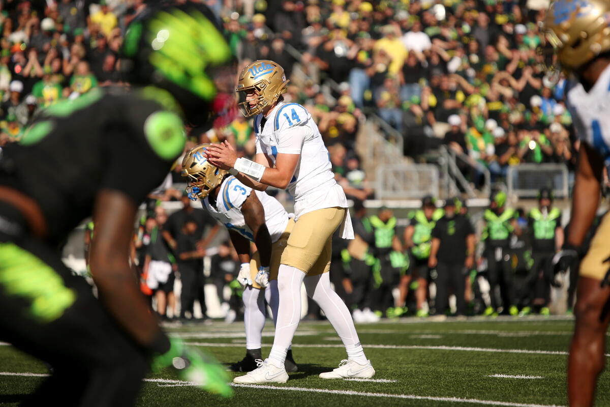 UCLA backmost Ty Dieffenbach prepares to person the shot during a triumph complete Oregon Saturday successful Eugene, Ore.