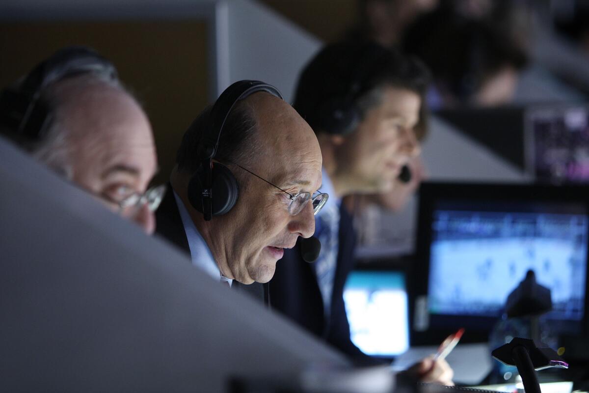 Former longtime Kings play-by-play announcer Bob Miller calls a game between the Kings and Edmonton Oilers at Staples Center in April 2010.
