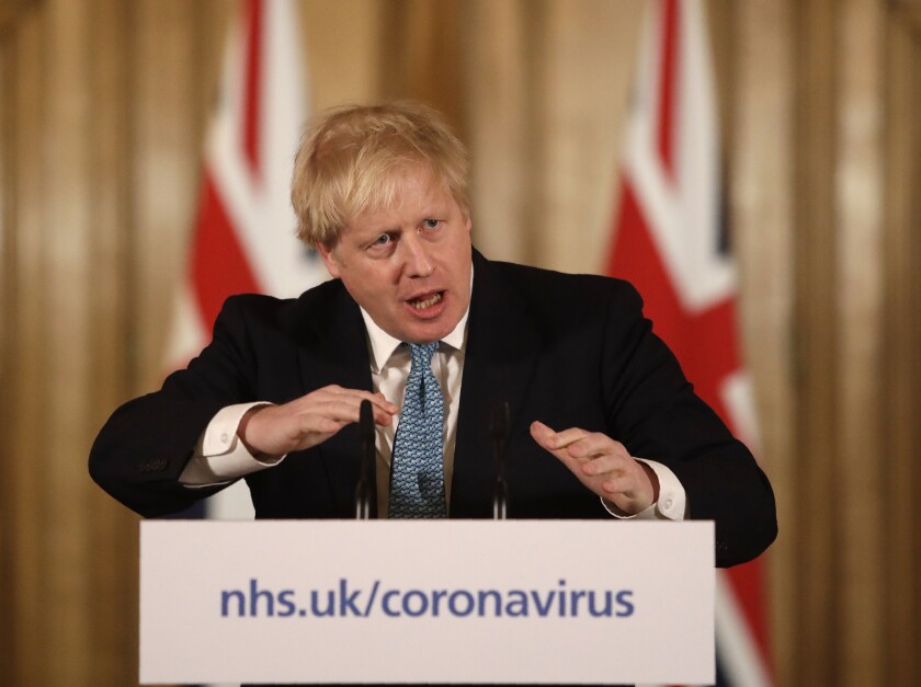 British Prime Minister Boris Johnson speaks at a press conference
