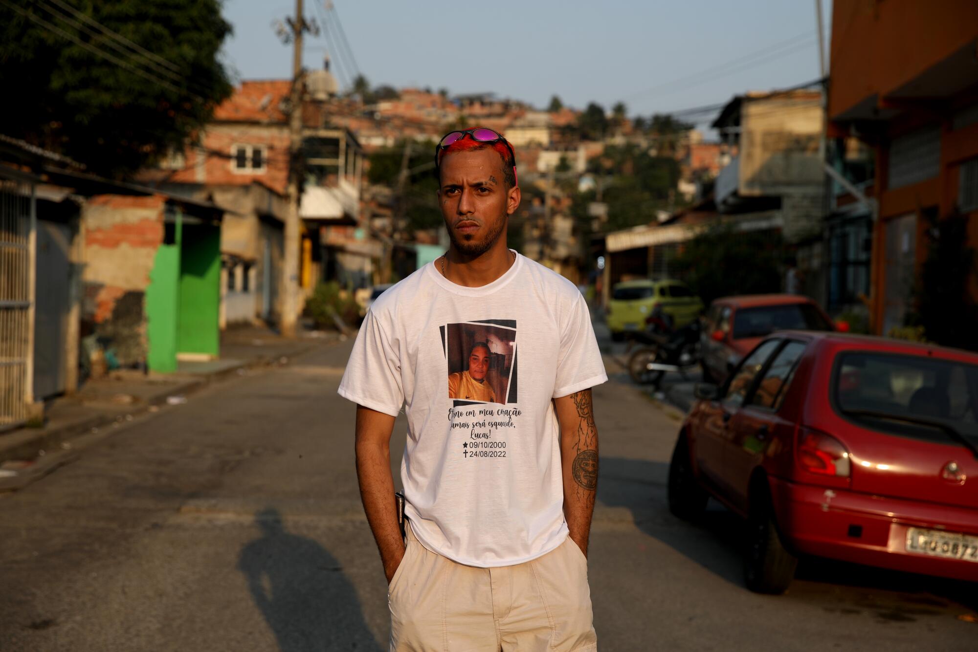 A man stands in a street.