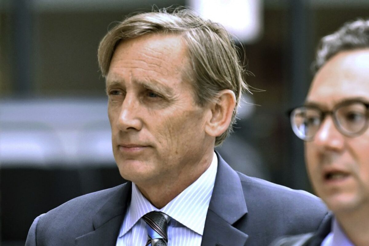 Jeffrey Bizzack arrives at federal court in Boston on July 24th where he pleaded guilty to charges in a college admissions bribery scandal. Bizzack was sentenced to two months in prison Wednesday, Oct. 30.