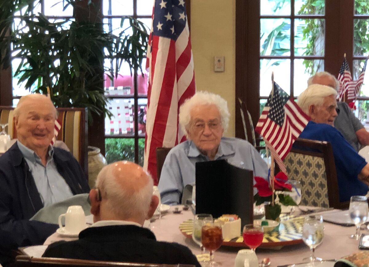 La Vida Del Mar resident John Campbell, 99, (left) is believed to be the oldest Pearl Harbor survivor in San Diego.