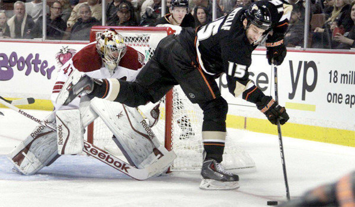 Ducks center Ryan Getzlaf backhands a puck in front of Coyotes goalie Mike Smith during Anaheim's 5-2 win over Phoenix at the Honda Center on Wednesday. Getzlaf scored his seventh goal of the season against Smith in the second period.