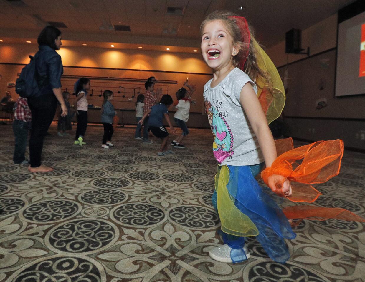Photo Gallery: Sock Hop at Buena Vista Branch Library for young children to gather donated socks for Ascencia in Glendale
