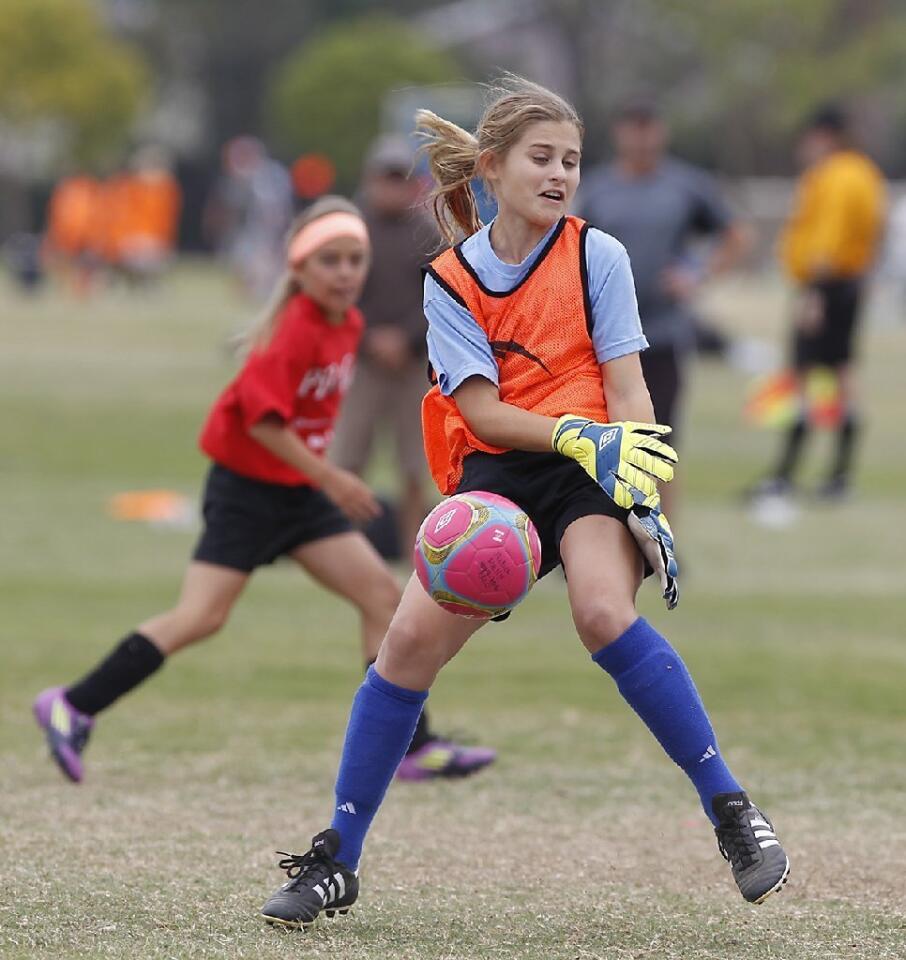 Andersen goalie Katelyn Purdy makes a save during girls' 5-6 gold division championship game against Kaiser in the Pilot Cup Sunday.