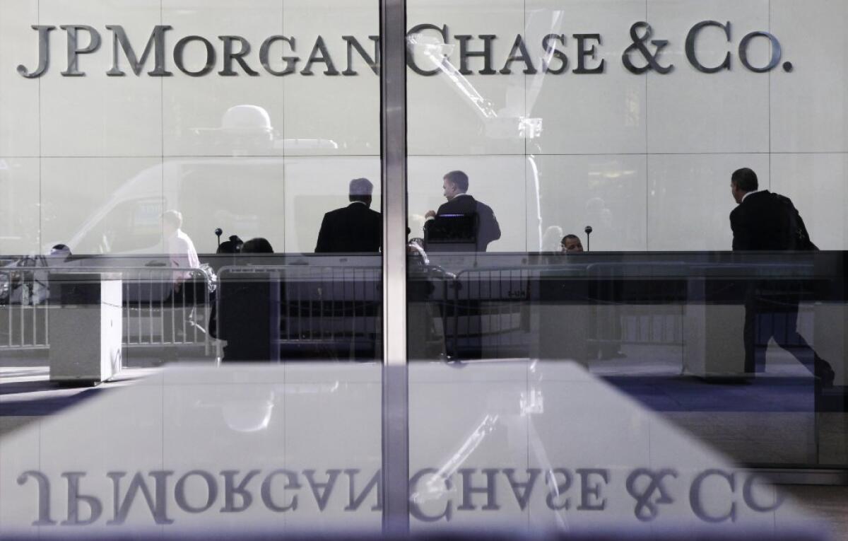 JPMorgan Chase will pay more than $200 million to settle probes of its debt-collection practices by federal authorities and 47 states -- not including California. Above, the bank's Park Avenue headquarters in New York.