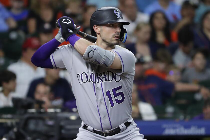 Colorado Rockies' Randal Grichuk bats against the Houston Astros on July 5, 2023, in Houston.