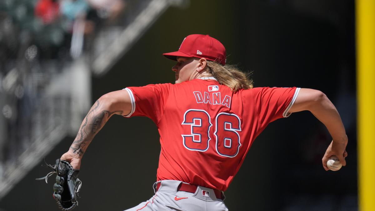 Angels starter Caden Dana delivers a pitch against the Rangers during the first inning Sunday.