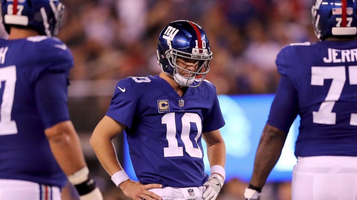 New York Giants quarterback Eli Manning appears frustrated during the fourth quarter of a 24-10 loss to the Detroit Lions on Sept. 18.