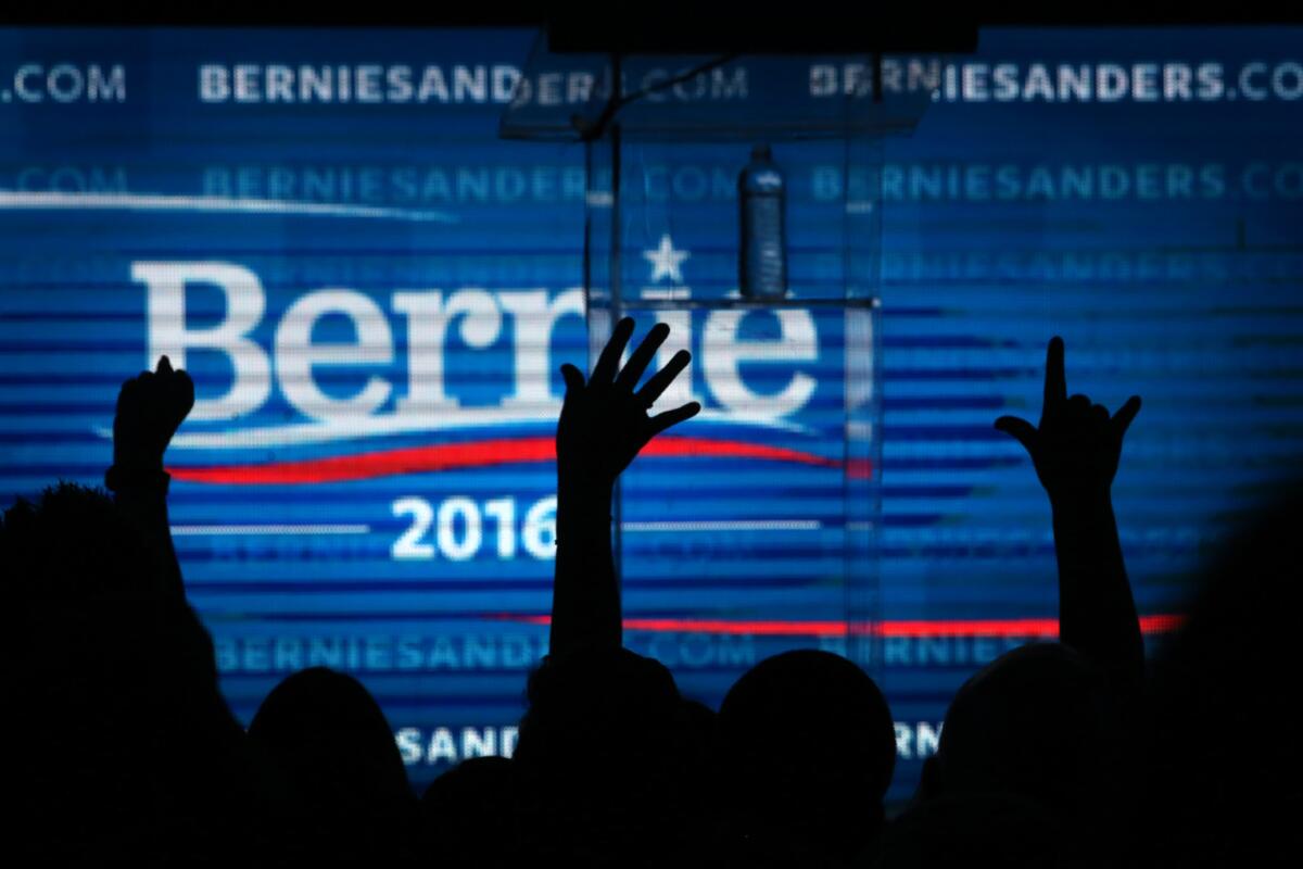 A crowd cheers at a fundraiser for Democratic presidential candidate Bernie Sanders at the Avalon hotel in Hollywood on Oct. 14, 2015.
