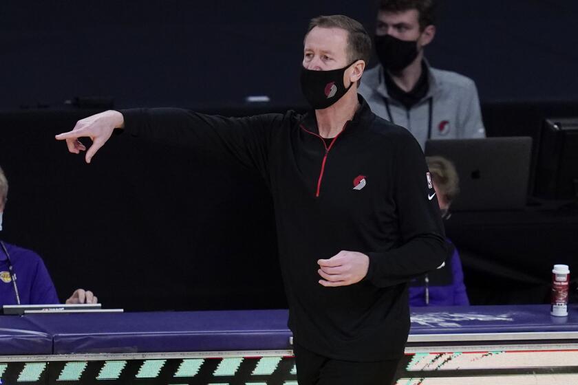 Portland Trail Blazers head coach Terry Stotts yells from the sideline during the second quarter.