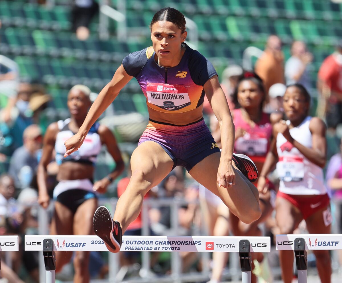EUGENE, OREGON - JUNE 25: Sydney McLaughlin sets a world record in the final of the Women 400 Meter Hurdles.