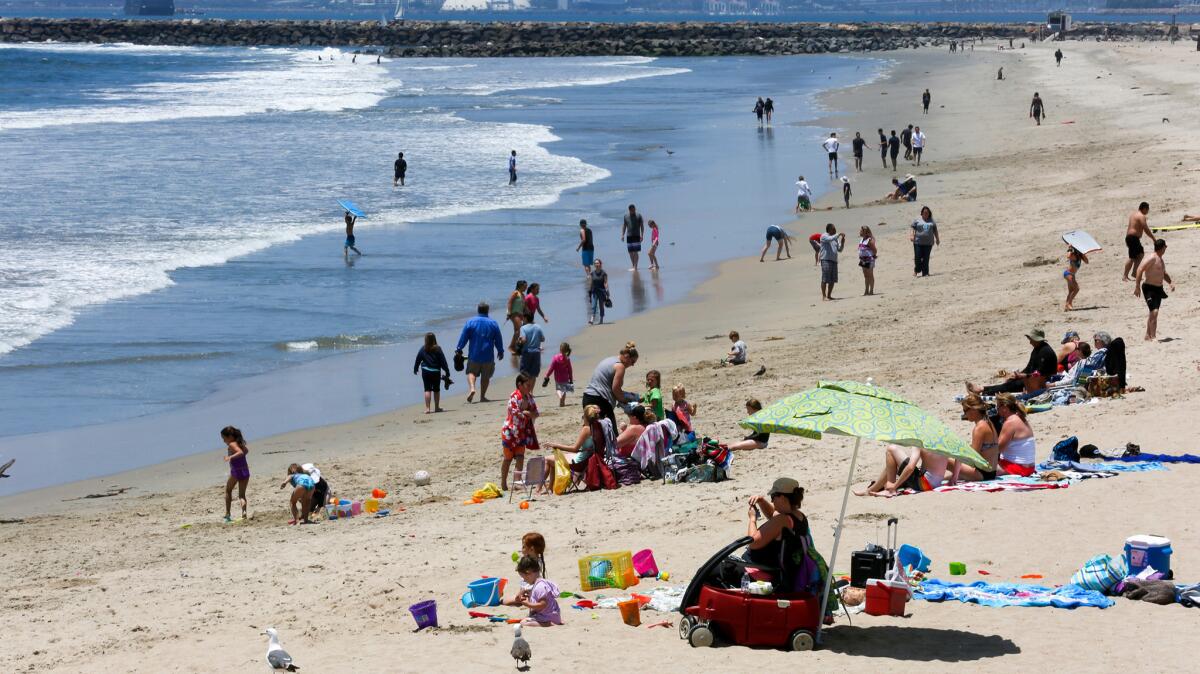 As the first days of summer approach and temperatures begin to rise, crowds head to the shoreline at Seal Beach.