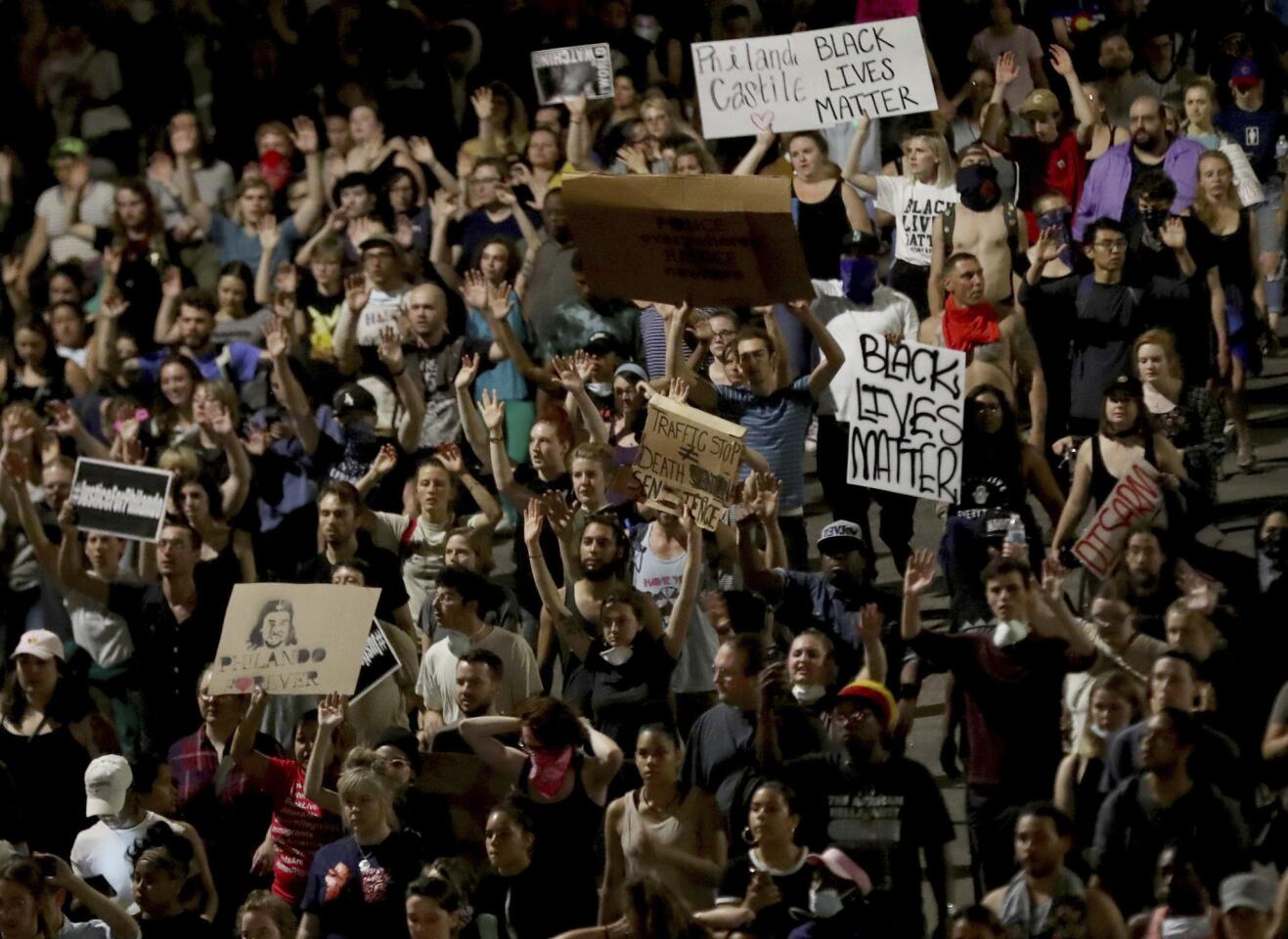 Demonstrators march along I-94 in St. Paul, Minn., after the Philando Castile verdict.