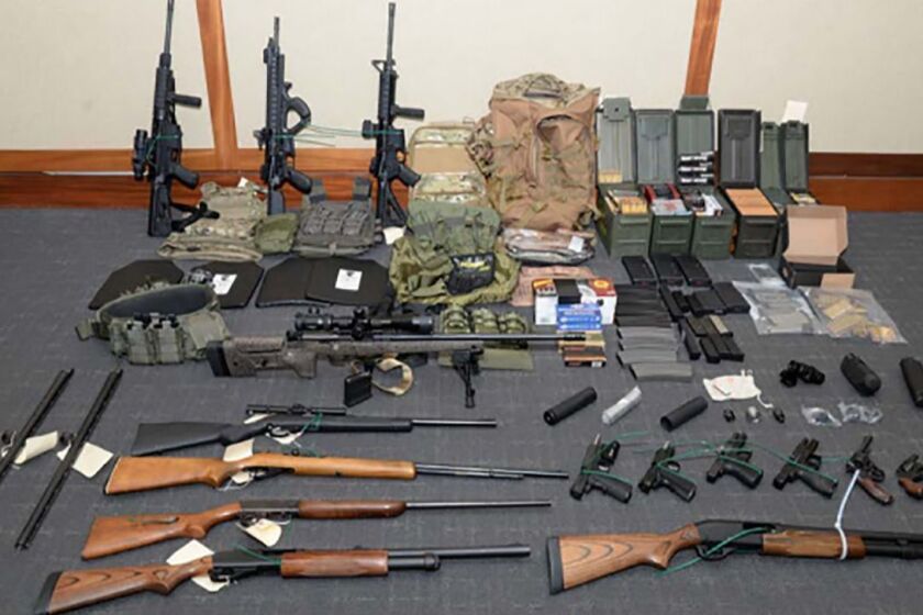 This undated image released by the US Attorney's Office on February 20, 2019, shows weapons seized at the Silver Spring, Maryland, home of US Coast Guard officer Christopher Paul Hasson. - Hasson, who espoused white supremacist views and drafted a target list of Democratic politicians and prominent media figures, has been arrested on firearms and drug charges. Hasson, an admirer of Norwegian mass murderer Anders Breivik, was arrested last week and a powerful arsenal seized from his home, according to court documents unsealed on February 20. "The defendant intends to murder innocent civilians on a scale rarely seen in this country," US District Attorney Robert Hur said in a motion seeking that Hasson be detained until trial. (Photo by HO / AFP) / RESTRICTED TO EDITORIAL USE - MANDATORY CREDIT "AFP PHOTO / US Attorney's Office" - NO MARKETING NO ADVERTISING CAMPAIGNS - DISTRIBUTED AS A SERVICE TO CLIENTSHO/AFP/Getty Images ** OUTS - ELSENT, FPG, CM - OUTS * NM, PH, VA if sourced by CT, LA or MoD **