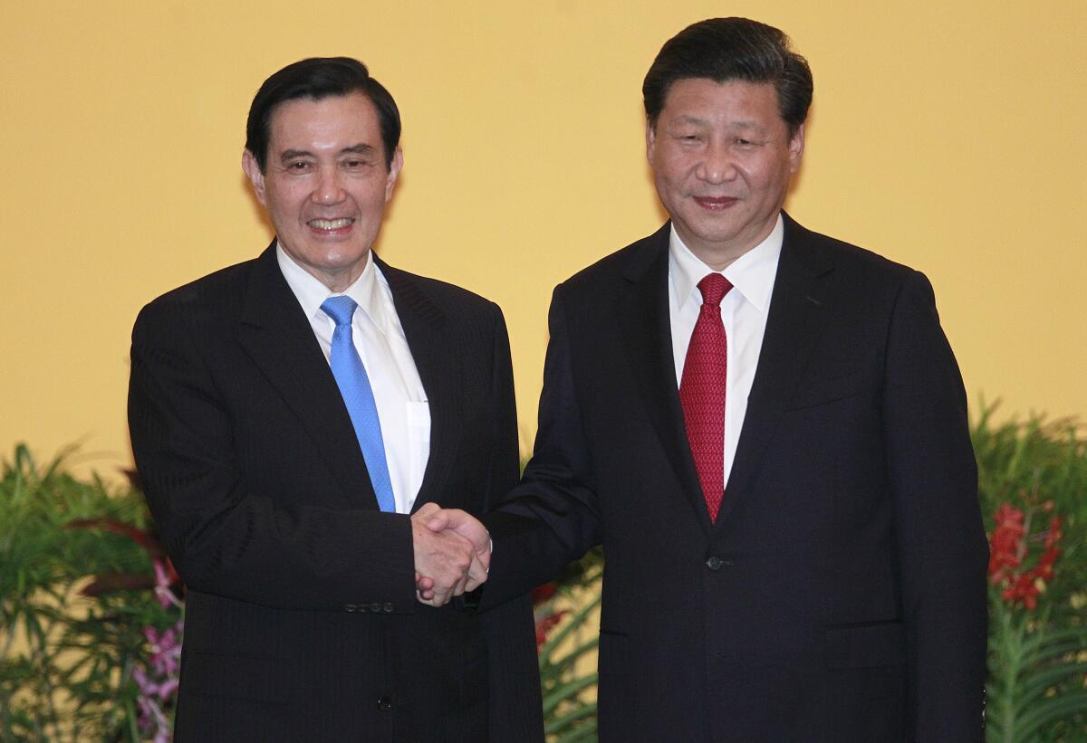 Then-Taiwanese President Ma Ying-jeou shaking hands with Chinese President Xi Jinping in 2015