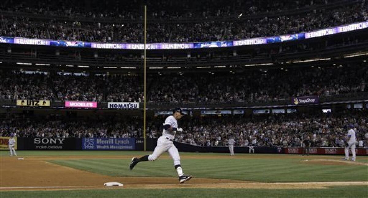 New York Yankees Derek Jeter hits an inside the park home run in the third  inning against the Kansas City Royals at Yankee Stadium in New York City on  July 22, 2010.