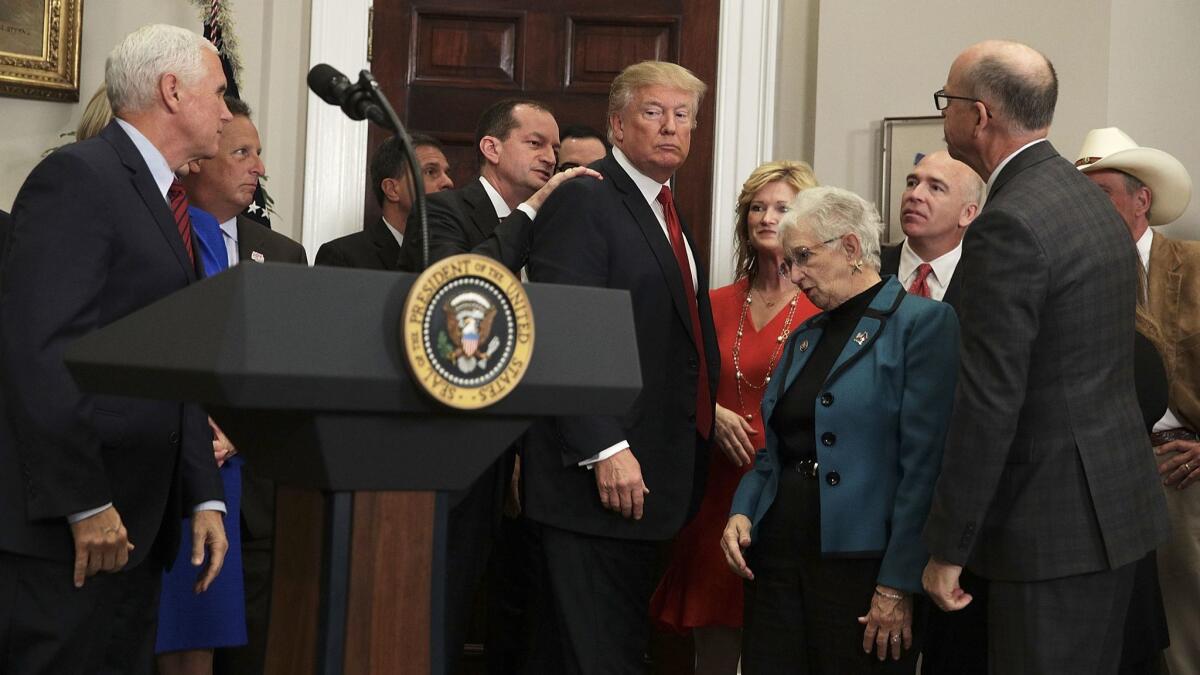 After making remarks about his executive order on Obamacare Thursday, President Trump almost left the room without signing the document, until aides turned him around.