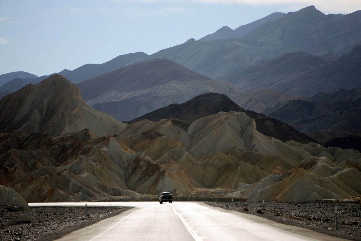California Highway 190 in Death Valley in California. Death Valley, the largest national park in the US, comprises more than 3.3 million acres of desert wilderness.