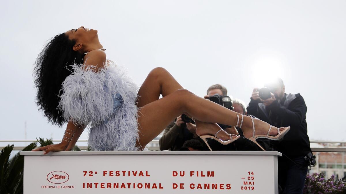 Bloom lives her best life as she poses for photographers at the Cannes Film Festival photo call.