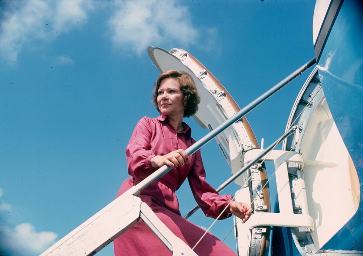 First Lady Rosalynn Carter boards an airplane.