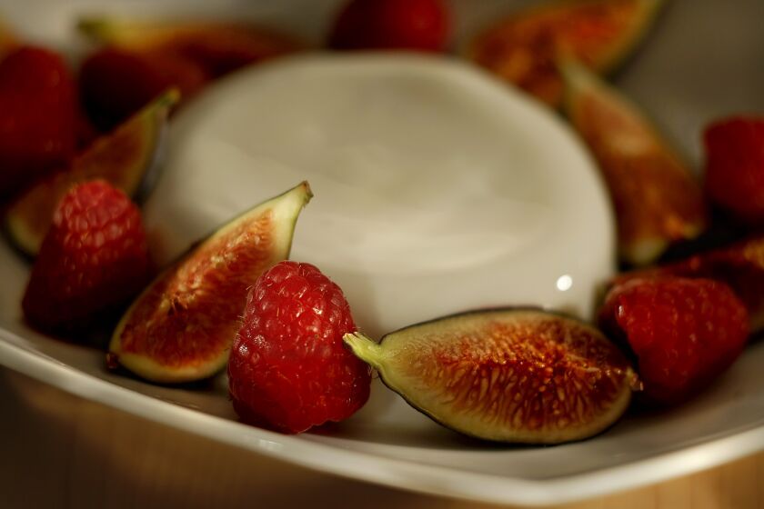 Panna cotta with figs and raspberries.