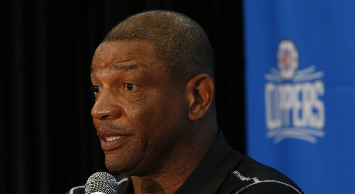 Clippers coach and president of basketball operations Doc Rivers speaks during a news conference on June 18 introducing newly acquired guard Lance Stephenson.