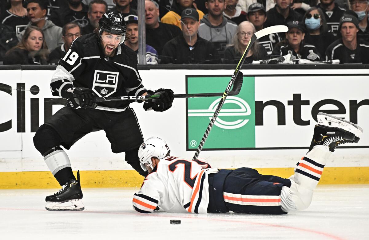 Alex Iafallo of the Kings battles for the puck with Darnell Nurse in the third period in Game 4.