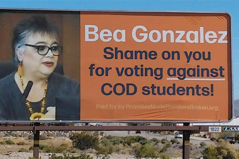 A Coachella Valley billboard reveals a political brawl over a long-planned College of the Desert campus in downtown Palm Springs.