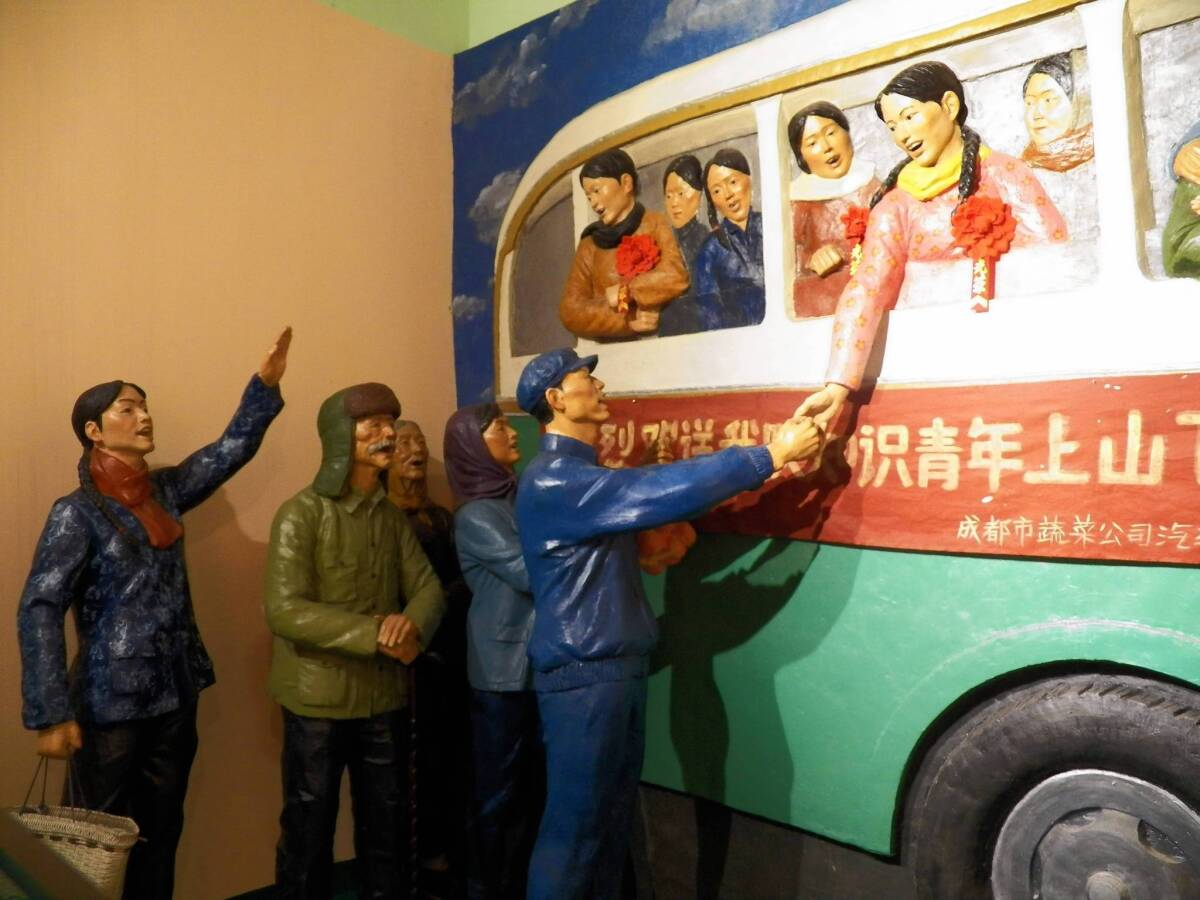 A life-size diorama at the Intellectual Youth building at the Jianchuan Museum Cluster in Anren, China, depicts parents sending off their children to the countryside. The collection chronicles the stories of 17 million educated adolescents who were sent to work in the rural areas during the Mao era.