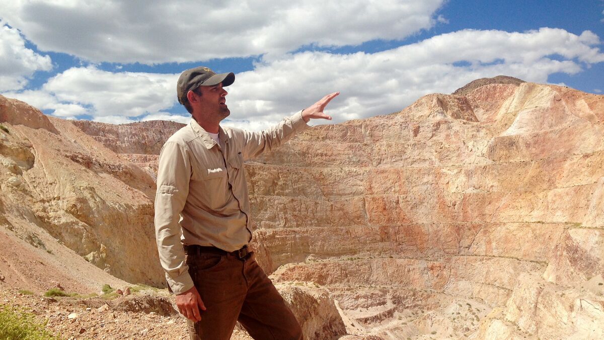 Aren Hall, environmental manager of the open-pit Newscastle mining operation, surveys the eastern Mojave Desert site.