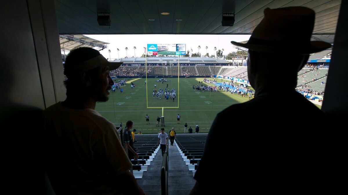 Fans watch from the South side of the stadium as the Chargers and Rams conduct a joint practice.