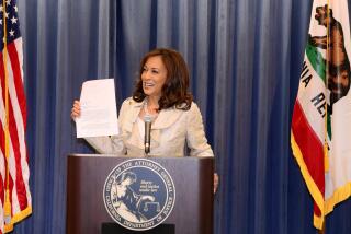 California Attorney General Kamala Harris discusses the Supreme Court ruling on Proposition 8 in Los Angeles Wednesday, June 26, 2013. The justices issued two 5-4 rulings in their final session of the term. One decision wiped away part of a federal anti-gay marriage law that has kept legally married same-sex couples from receiving tax, health and pension benefits. The other was a technical legal ruling that said nothing at all about same-sex marriage, but left in place a trial court's declaration that California's Proposition 8 is unconstitutional. (AP Photo/Damian Dovarganes)