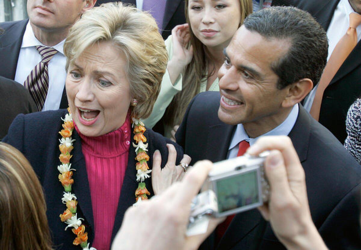 Then-Democratic presidential hopeful Hillary Rodham Clinton campaigns at Los Angeles City Hall with a key supporter, then-Mayor Antonio Villaraigosa.