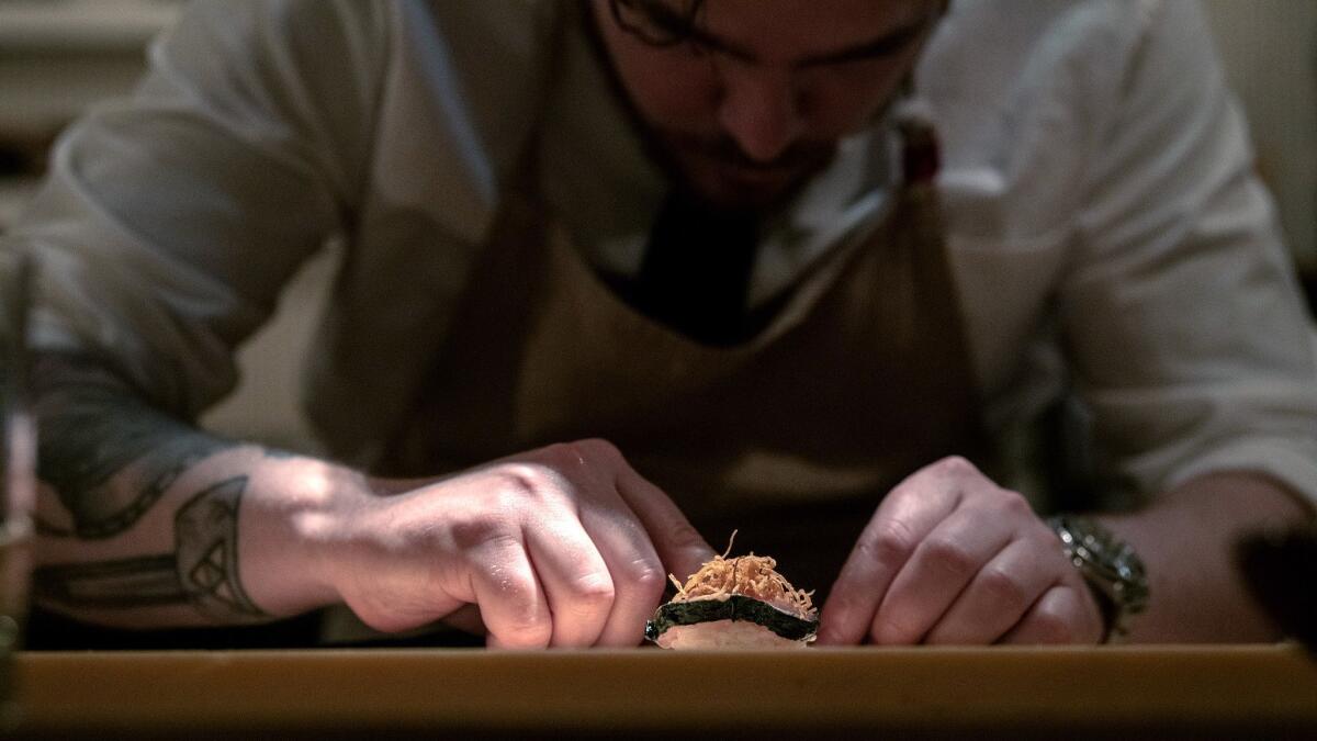 Chef Phillip Frankland Lee at his omakase-style tasting menu speak-easy, Sushi Bar.