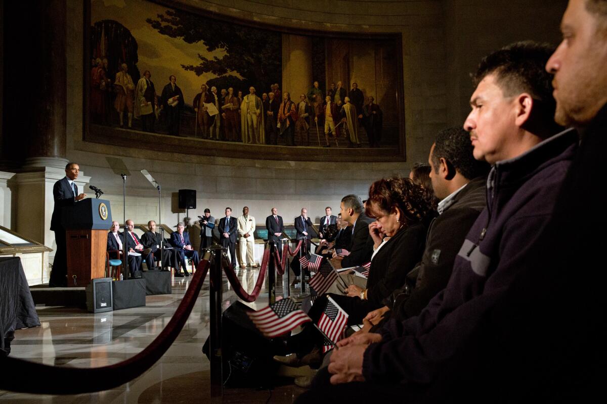President Obama speaks during a naturalization ceremony for new U.S. citizens at the National Archives on Dec. 15, 2015.