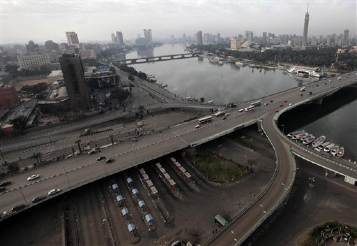 A view of Cairo and the Nile river in Cairo, Egypt, Tuesday, Feb 1, 2011. Security officials say authorities have shut down all roads and public transportation to Cairo, where tens of thousands of people are converging to demand the ouster of Egyptian President Hosni Mubarak after nearly 30 years in power. (AP Photo/Lefteris Pitarakis)