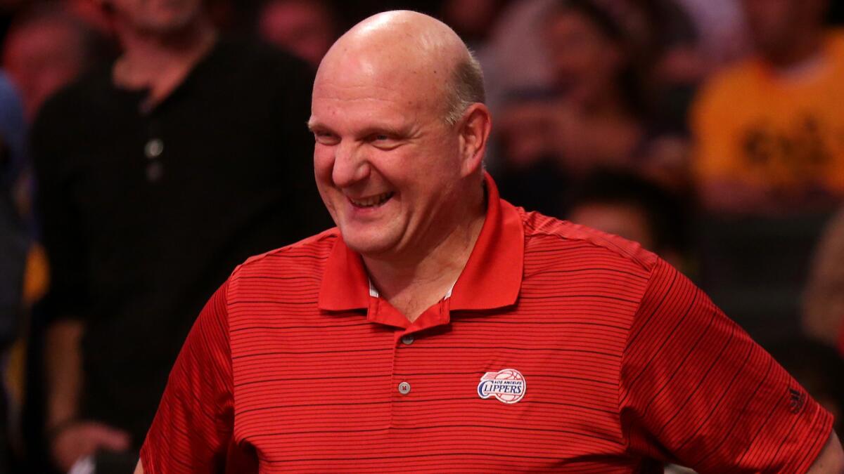 Clippers owner Steve Ballmer smiles while watching his team beat the Lakers at Staples Center on Oct. 31.