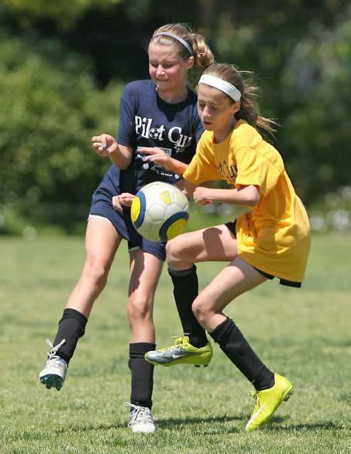 Carden Hall's Sophia Morris, right, battles with Pegaus defender in championship game Sunday.