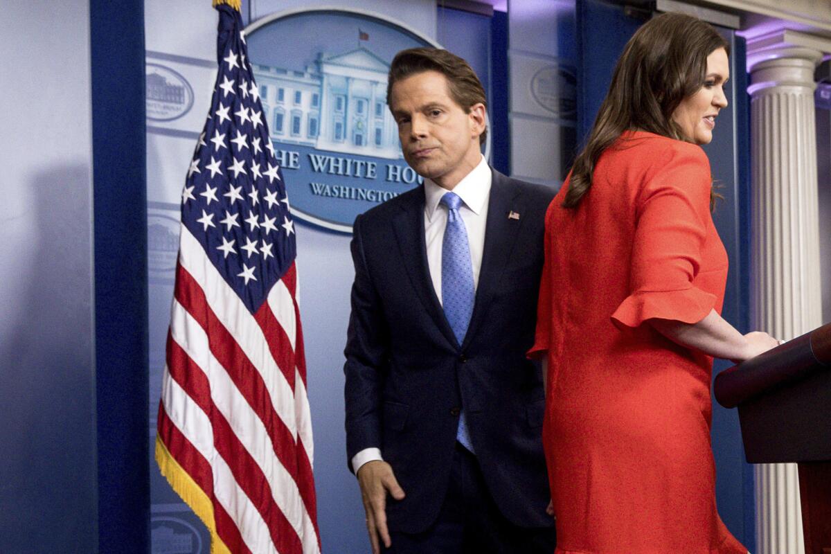 Taking the podium: Newly appointed White House press secretary Sarah Huckabee Sanders, right, and Anthony Scaramucci, incoming White House communications director, left, at the daily press briefing at the White House, Friday, July 21, 2017.