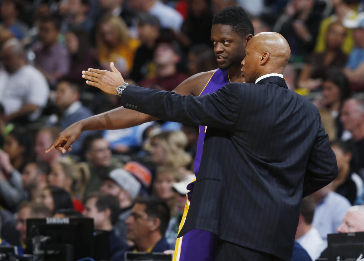 Lakers Coach Byron Scott, right, says he gets along just fine with Julius Randle.