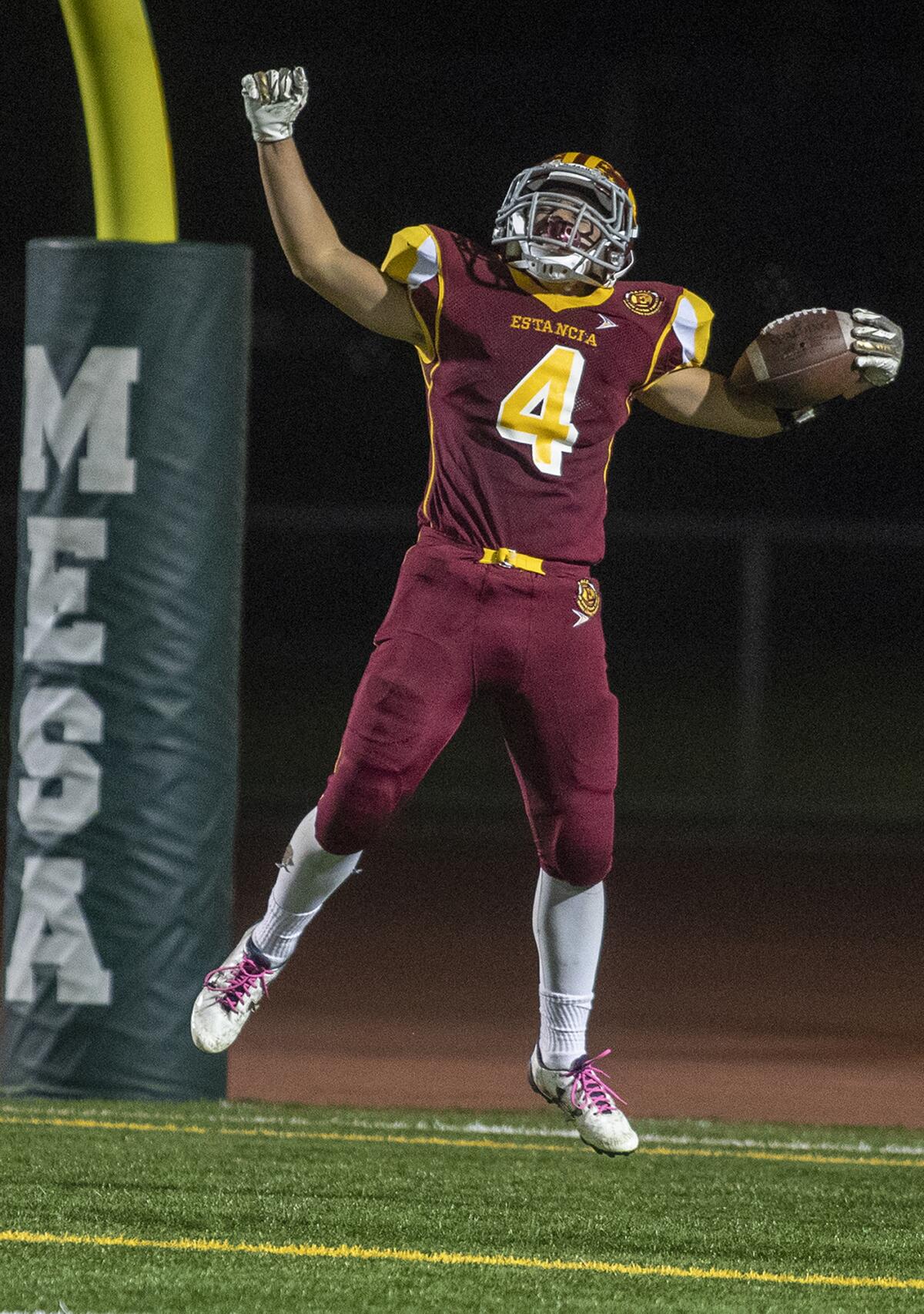 Estancia's Tony Valdez celebrates after catching a 43-yard touchdown in the first quarter against Saddleback during an Orange Coast League game at Cost Mesa High on Thursday.