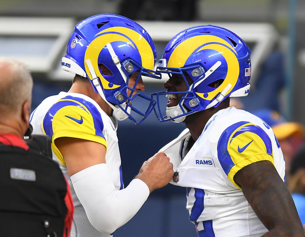 Rams quarterback Matthew Stafford celebrates with Van Jefferson after a touchdown pass.