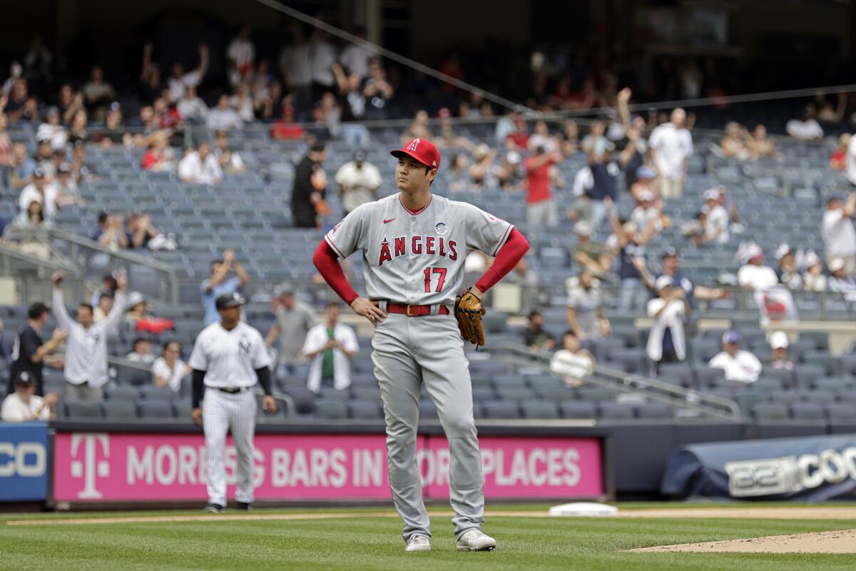 Angels pitcher Shohei Ohtani reacts after giving up a home run to New York Yankees.