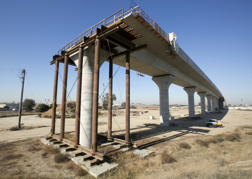 FILE - This Dec. 6, 2017, file photo shows one of the elevated sections of the high-speed rail under construction in Fresno, Calif. California Gov. Gavin Newsom on Friday, May 14, 2021, proposed spending $11 billion on transportation improvements, half of it for a troubled bullet train intended to eventually link California's major metropolitan areas and for projects supporting the 2028 Summer Olympics in Los Angeles. (AP Photo/Rich Pedroncelli, File)