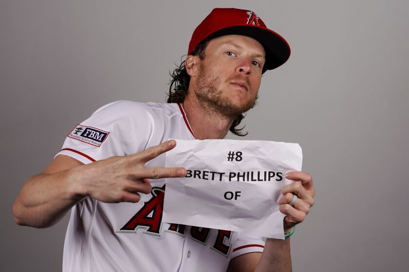 Los Angeles Angels' Brett Phillips poses for a picture at a baseball photo day at spring training Tuesday, Feb. 21, 2023, in Tempe, Ariz. (AP Photo/Morry Gash)