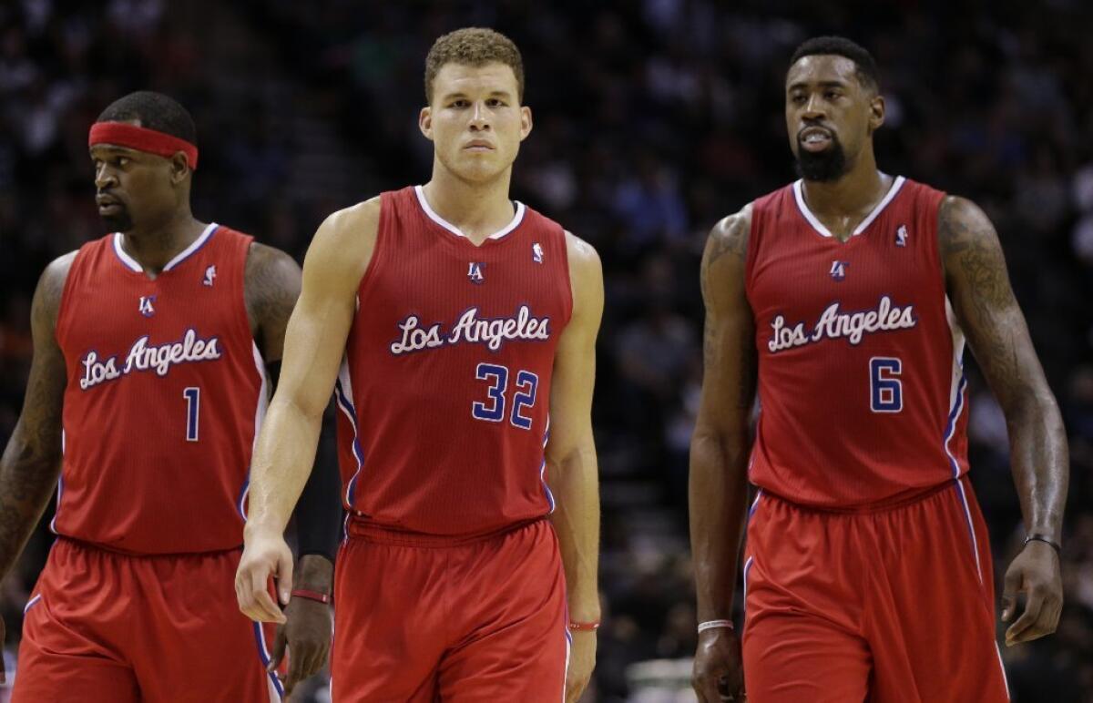 Stephen Jackson, left, with Blake Griffin and DeAndre Jordan.