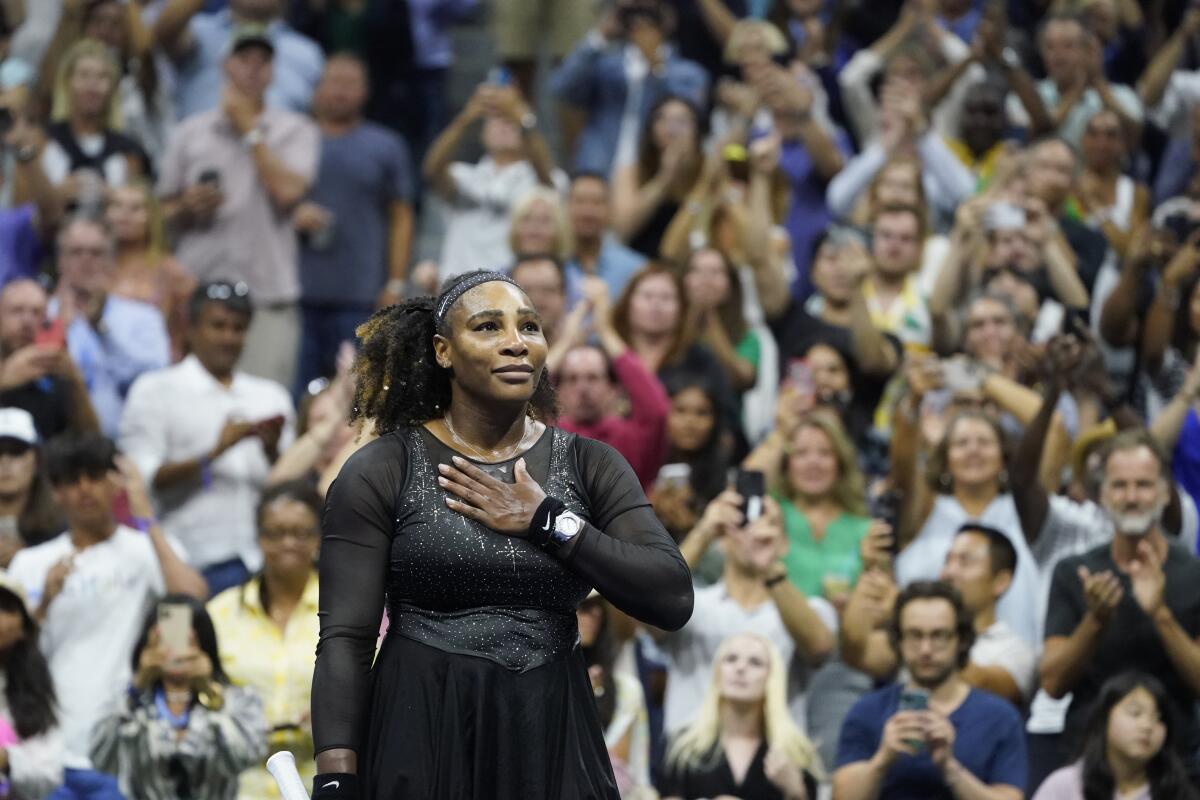 Serena Williams acknowledges the crowd after losing to Ajla Tomljanovic in the third round of the U.S. Open.