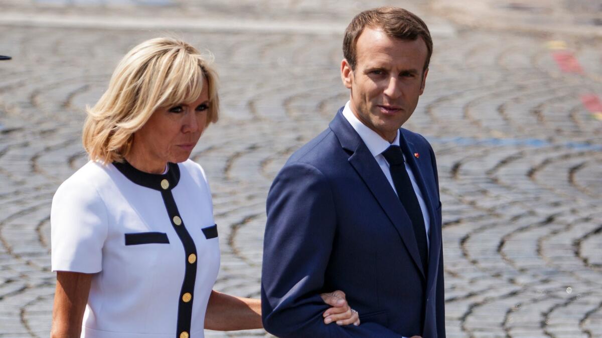 Emmanuel and Brigitte Macron attend the annual Bastille Day military parade in Paris.